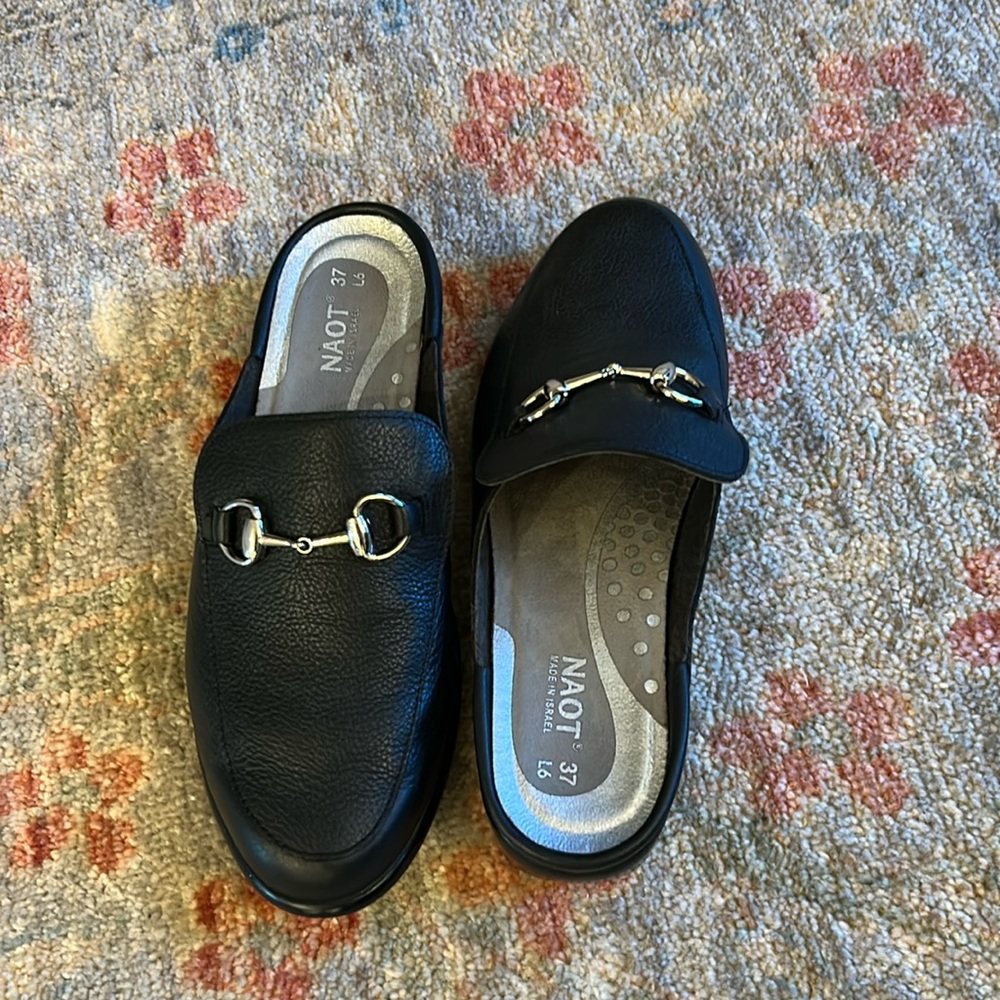 Naot leather slides.
